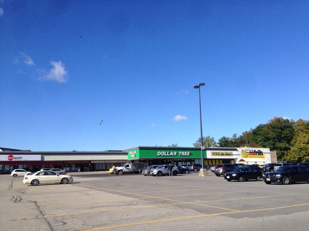 Tenant signage at Forest Glen Shopping Centre grocery-anchored retail property in Kitchener, Ontario